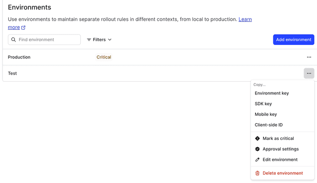 The Environments list with the overflow menu open and the SDK credential options displayed.