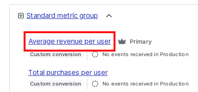 A metric group with the primary metric denoted by a crown icon.